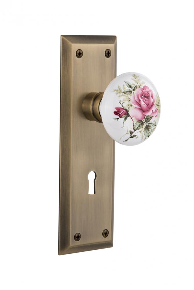 Nostalgic Warehouse New York Plate with Keyhole Single Dummy White Rose Porcelain Door Knob in Ant Nostalgic Warehouse New York Plate with Keyhole Single Dummy White Rose Porcelain Door Knob in Ant